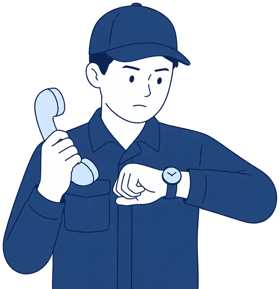 受話器を手にしたまま腕時計に目をやり、返事を待っている作業者